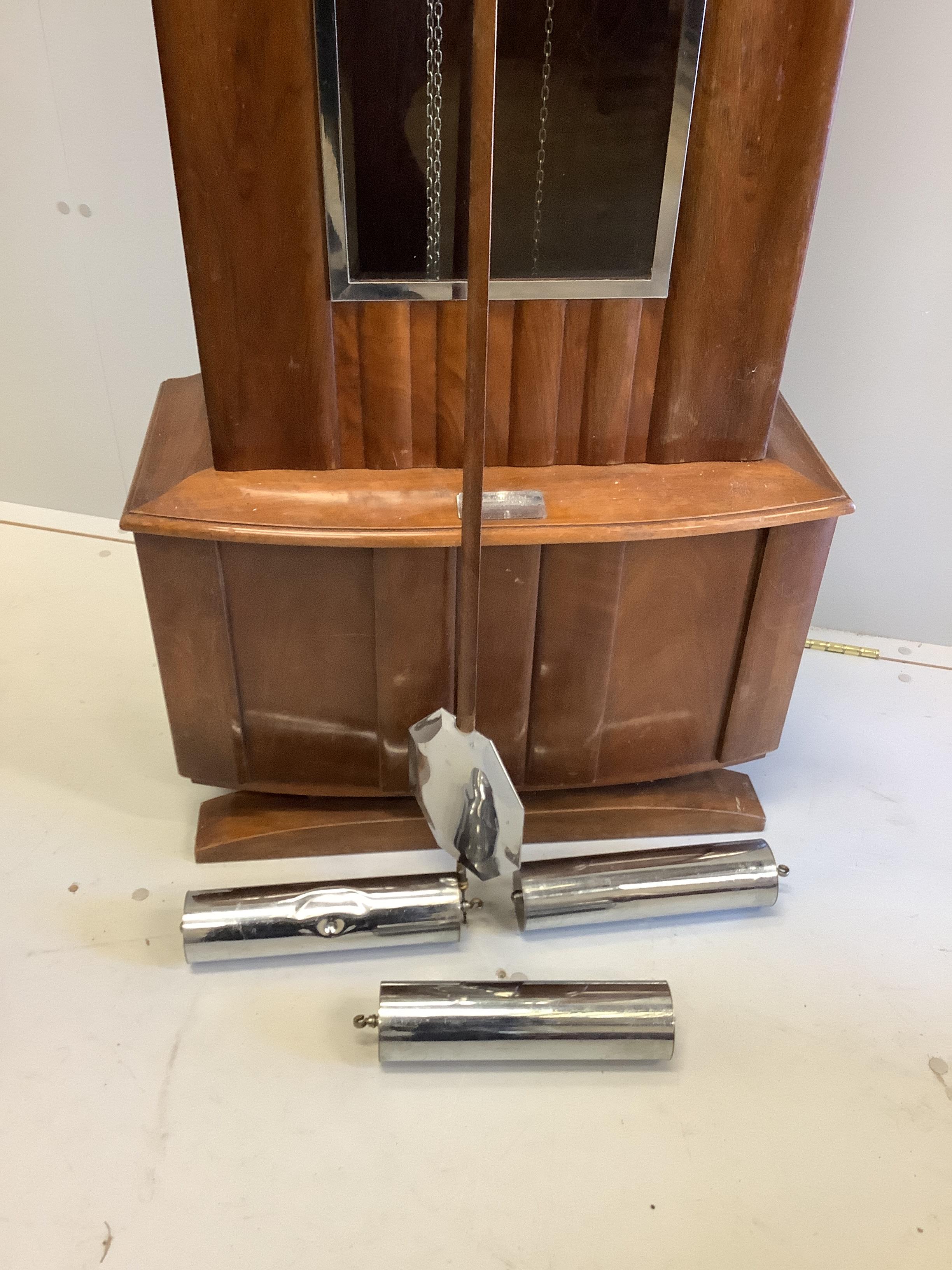 An Art Deco walnut longcase clock with three weights and a pendulum, height 200cm